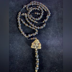 Yoga Mala bead necklace with happy Buddha finial